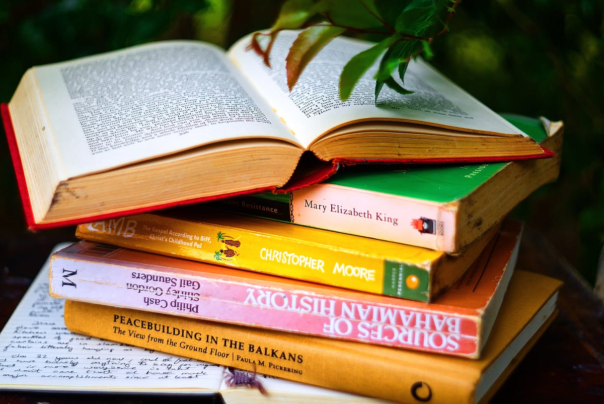 five stacked books